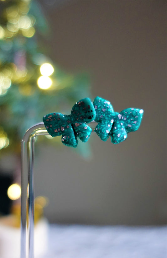 green christmas bow studs with silver glitter