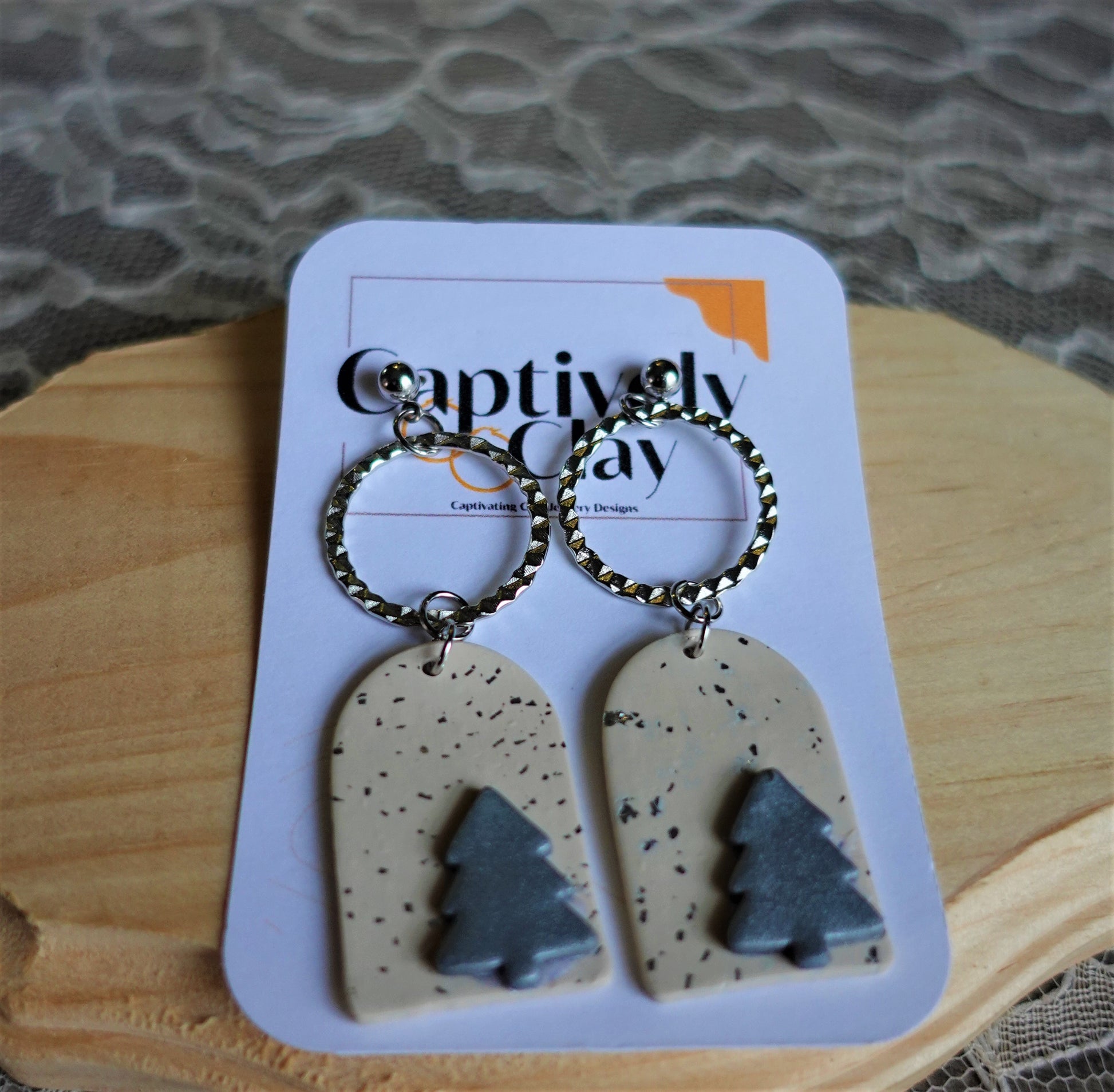 beige earrings with silver glitter, silver christmas tree and silver components