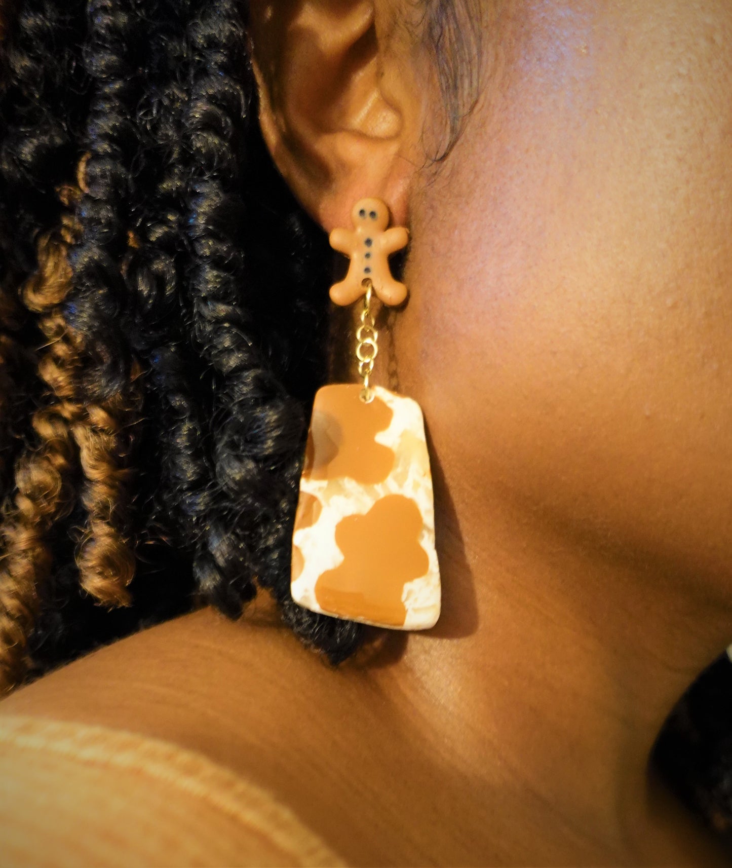 brown and beige gingerbread man dangled earrings